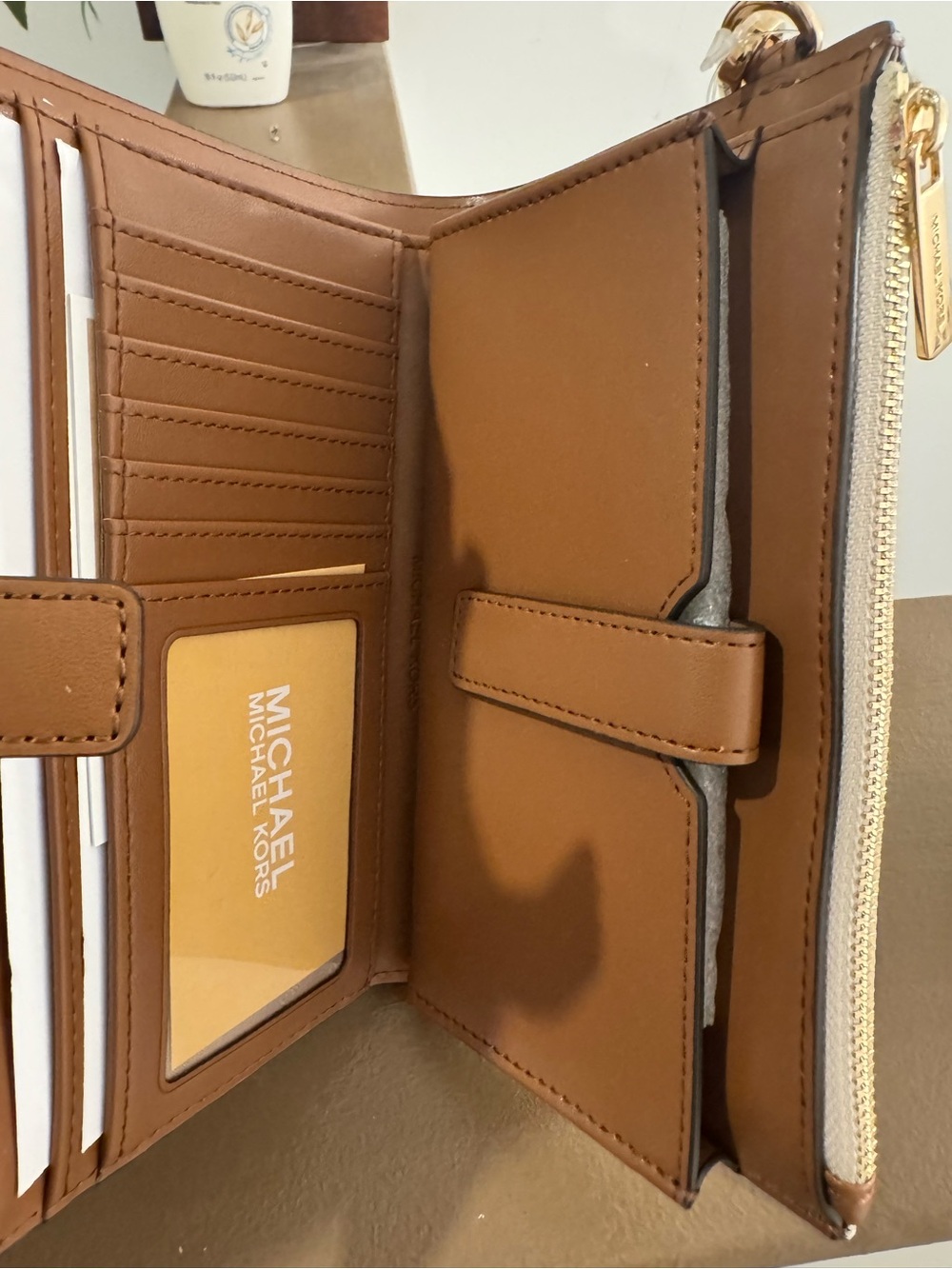 NWT Michael Kors Beige Logo Wristlet with Gold Accents - Picture 3 of 9